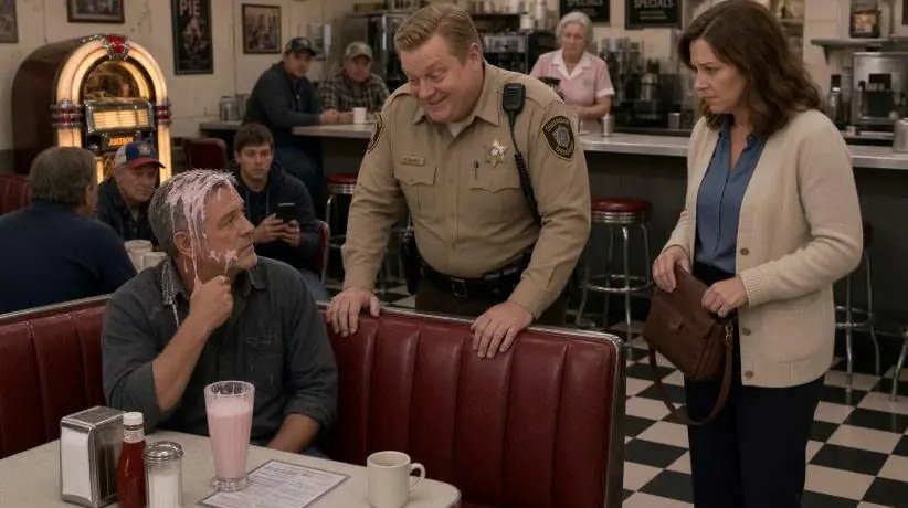 The Sheriff Poured a Milkshake Over a Quiet Retired Mechanic — Then the Old Man Noticed His Wife Give Him a Signal
