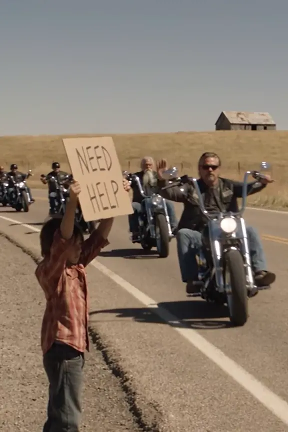 The Boy With the Cardboard Sign Stopped Thirty Motorcycles. Before Sunset, an Old Vest Revealed Why None of Them Were Strangers